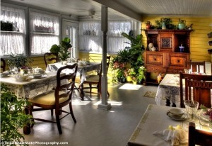 Our breakfast room with lots of sunlight and tables for each room.