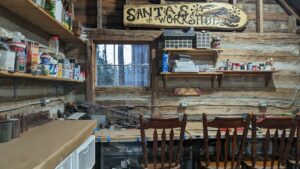 Santa's Workshop Wood Sign,, Work Table, Supplies, and Chairs